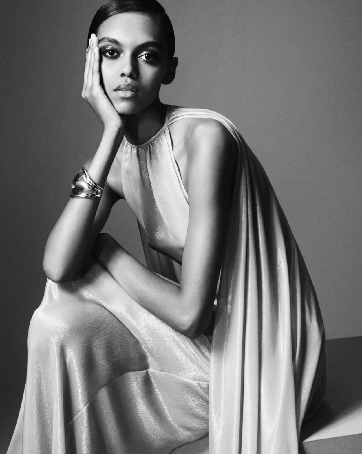 EVENING DRESS WITH KEYHOLE NECKLINE AND ASYMMETRIC CAPE